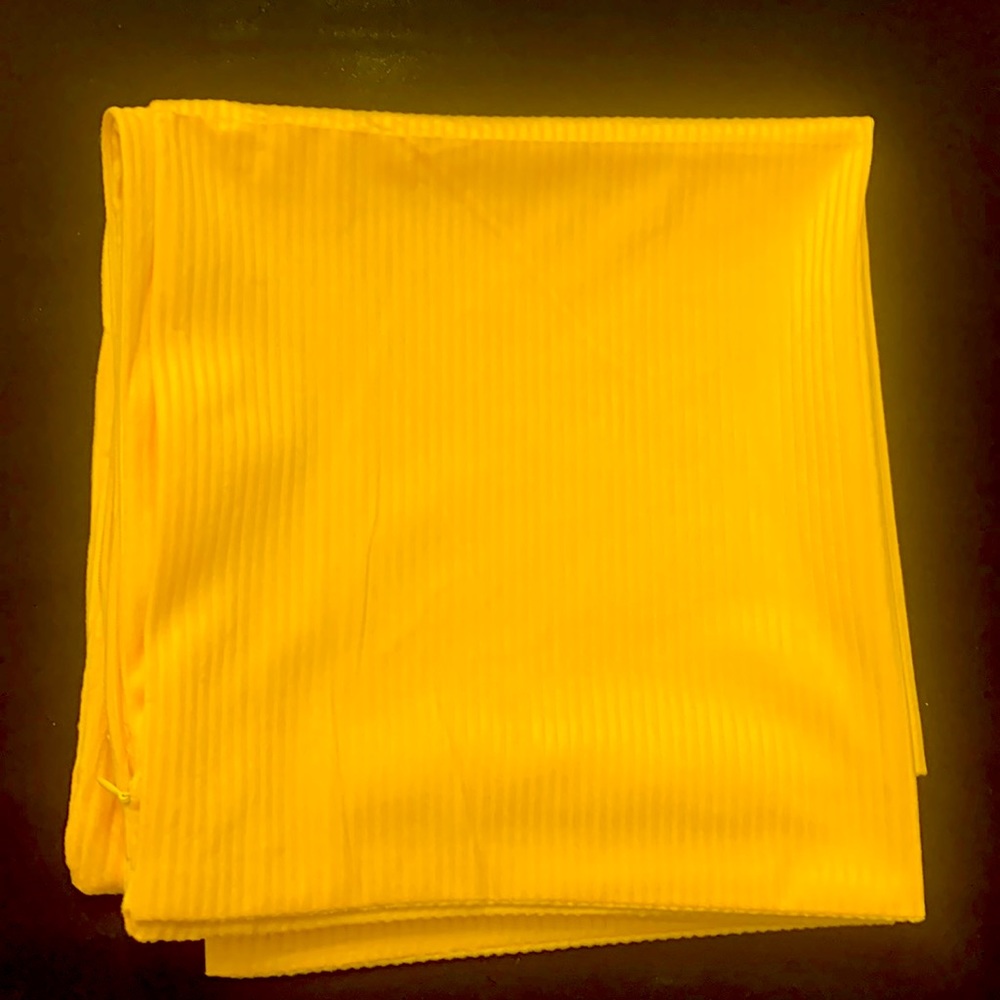 Three yellow pillow cases.